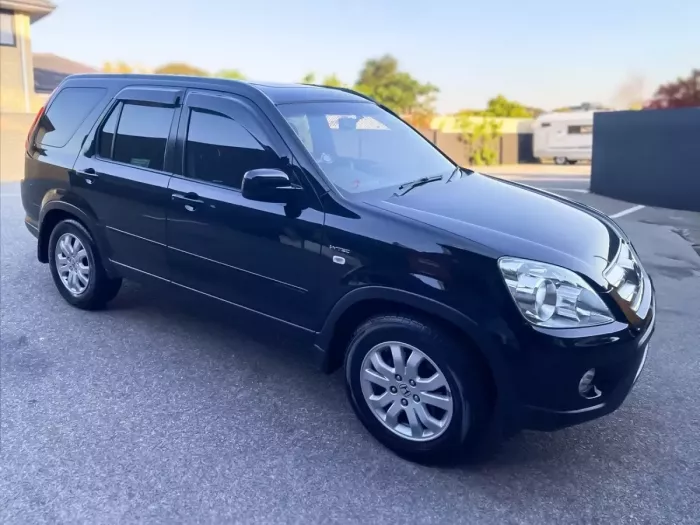 Дефлектори вікон Honda CR-V II (01-06) - Hic (накладні) 3