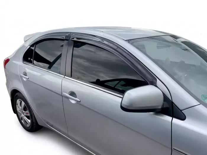 Дефлектори вікон Mitsubishi Lancer X (07-15) - Hic (накладні) 5