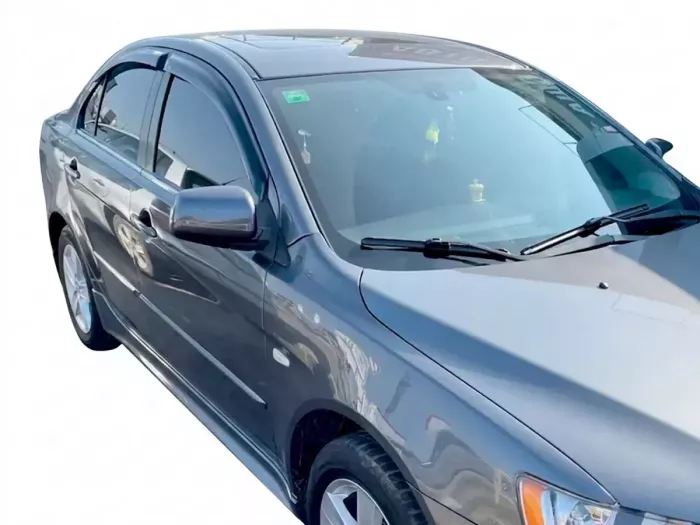 Дефлектори вікон Mitsubishi Lancer X (07-15) - Hic (накладні) 6
