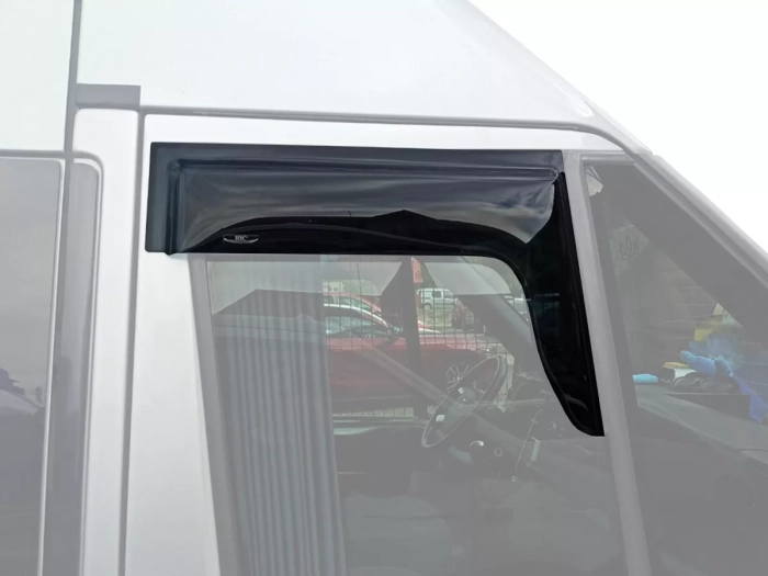 Дефлектори вікон Ford Transit III (00-13) - Hic (накладні) 1