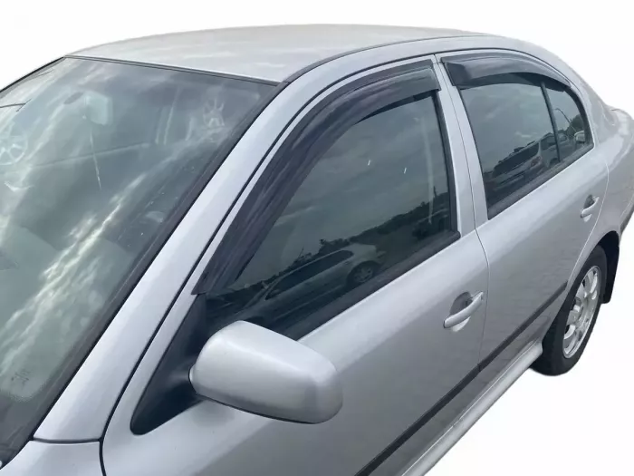 Дефлектори вікон Skoda Octavia II (A5; 04-12) Liftback - Defl Lux (накладні) 5