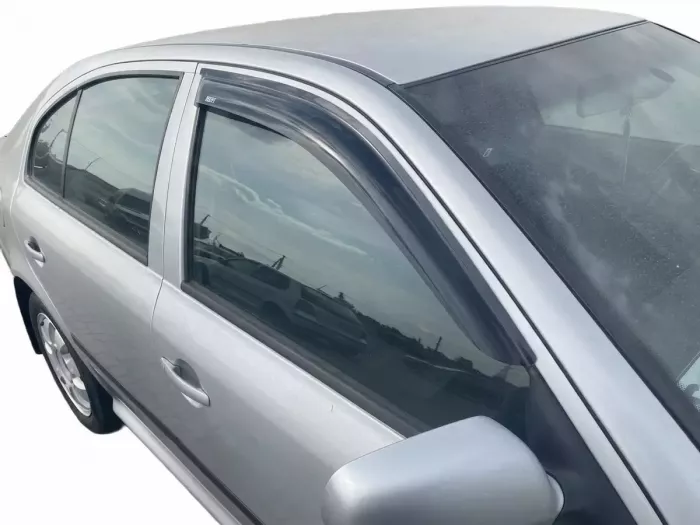 Дефлектори вікон Skoda Octavia II (A5; 04-12) Liftback - Defl Lux (накладні) 7