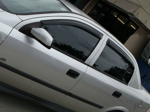 Дефлекторы окон Opel Astra G (98-09) Sd / Htb - Hic (накладные)