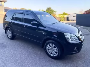 Дефлектори вікон Honda CR-V II (01-06) - Hic (накладні) 3