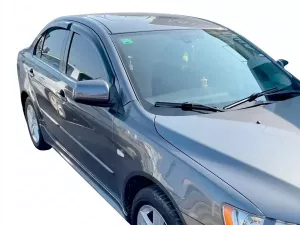 Дефлектори вікон Mitsubishi Lancer X (07-15) - Hic (накладні) 6