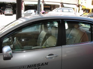 Дефлектори вікон Nissan Tiida I (C11; 04-11) Sedan - Hic (накладні) 4