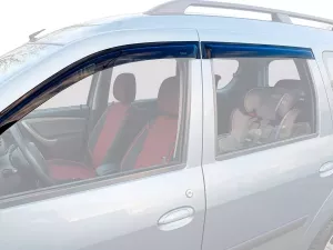 Дефлектори вікон Dacia Logan MCV (07-13) - Defl (накладні)