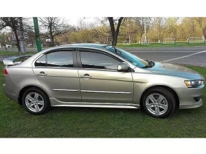 Дефлекторы окон Mitsubishi Lancer X (07-15) - Defl (накладные) 4