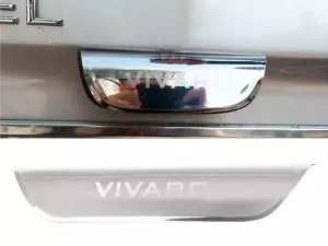 Хром накладка над номером Opel Vivaro A (01-14) - Carmos (с надписью)