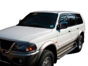 Дефлектори вікон Mitsubishi Pajero Sport I (96-08) - Hic (накладні) 4