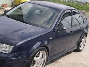 Дефлектори вікон VW Bora A4 (98-05) Sedan - Hic (накладні) 4