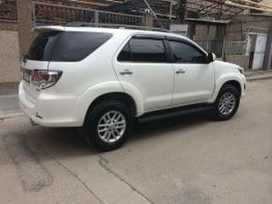 Дефлектори вікон Toyota Fortuner I (05-15) - Hic (накладні) 4